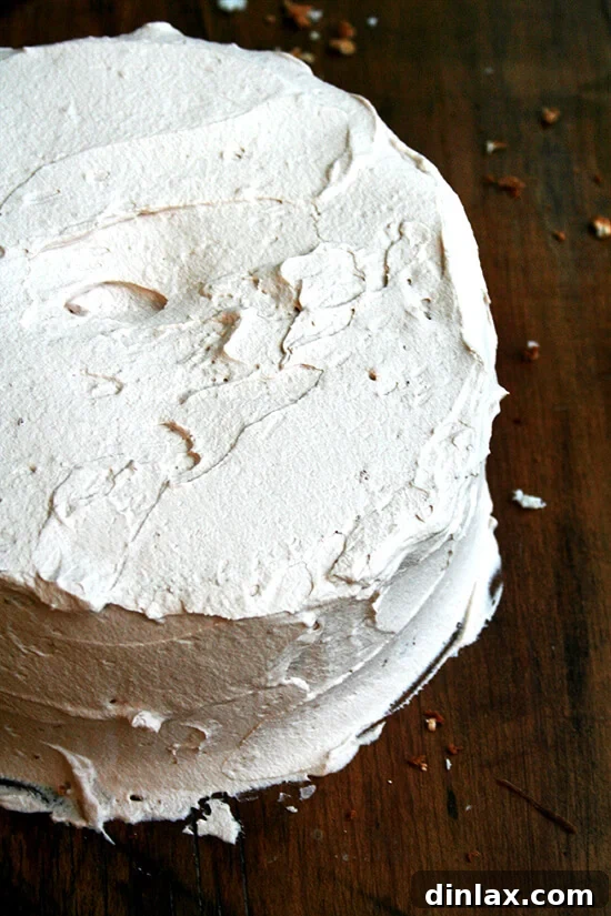 A beautifully frosted angel food cake, ready to serve