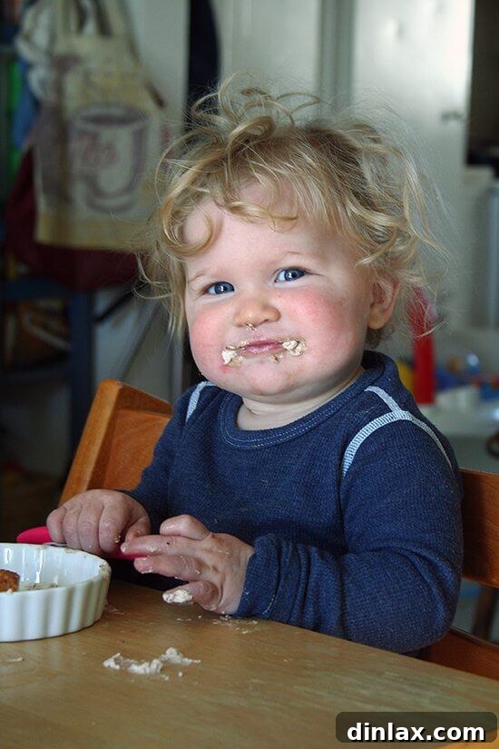 Family celebrating a birthday with angel food cake
