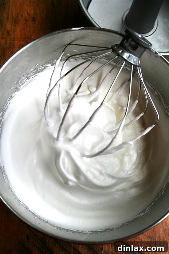Perfectly beaten egg whites for Angel Food Cake, showing soft, moist peaks