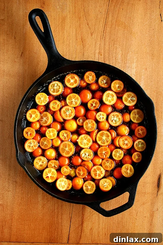 Golden Kumquat Crown Cake 4 Kumquats gently caramelizing in a skillet with butter, brown sugar, honey, vanilla, and salt.