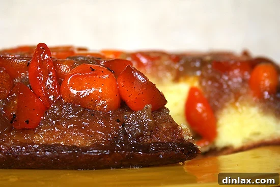 Golden Kumquat Crown Cake 8 Side view of the Kumquat Upside Down Cake, highlighting its height and the elegant fruit layer.