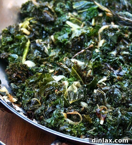 An appetizing overhead shot of Suzanne Goin's slow-cooked kale recipe, prepared to perfection.