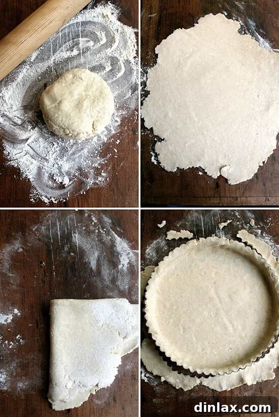 The delicate process of rolling out the tart dough to achieve a perfectly even base for the rich maple filling. Dough for the maple cream tart being rolled out on a floured surface.