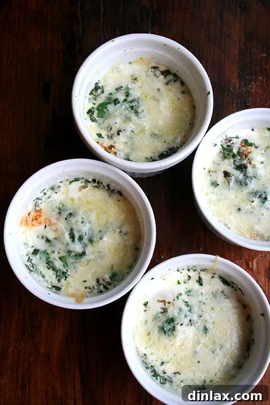 4 just-baked baked (shirred) eggs.