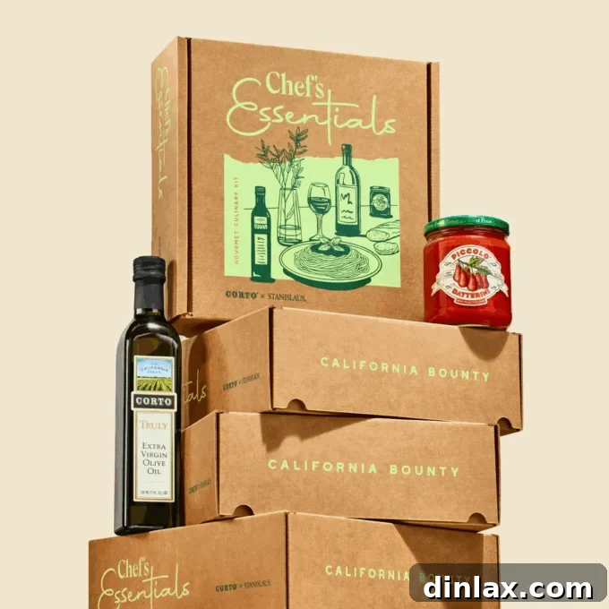 9 Awesome Father's Day Gift Ideas 16 The Corto x Stanislaus Chef’s Essentials Kit, prominently featuring high-quality olive oil and premium jarred tomatoes, essential for gourmet cooking.