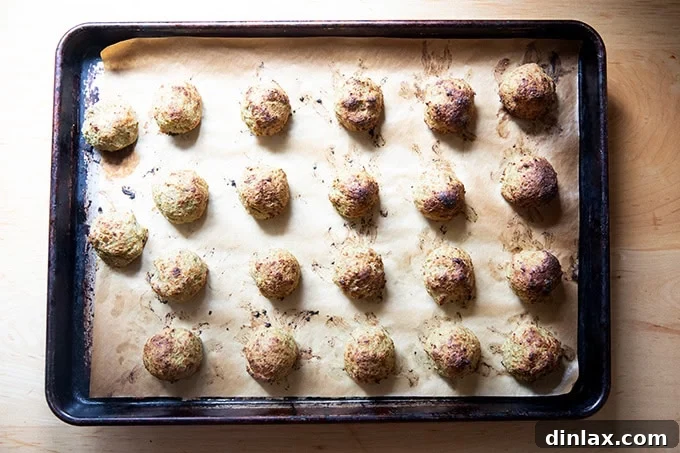 Smoky Eggplant Vegan Meatballs 13 Roasted eggplant meatballs on a sheet pan.