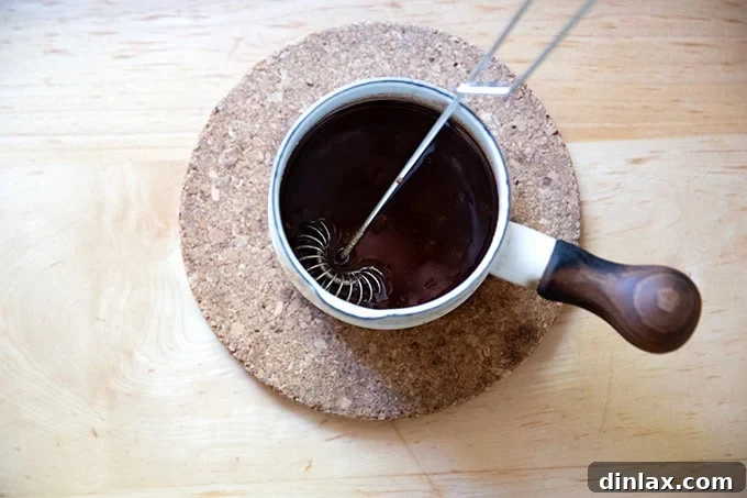 Effortless Cinnamon Sugar Focaccia 15 The cinnamon-sugar-butter mixture in a small saucepan, perfectly whisked until smooth and ready to be used.