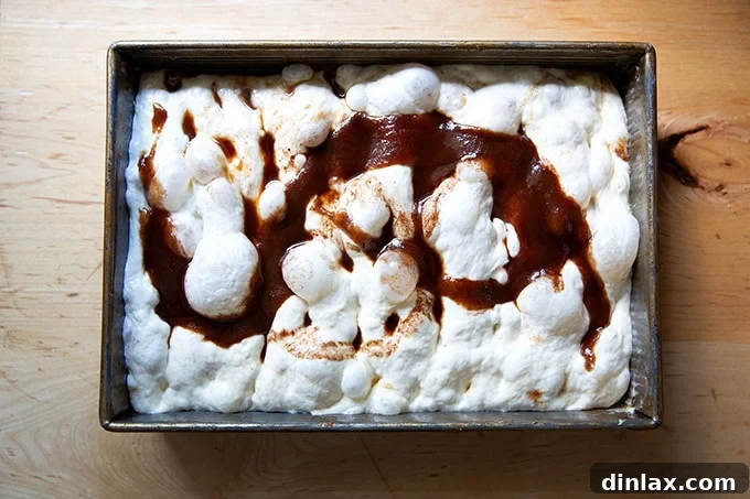 Effortless Cinnamon Sugar Focaccia 19 Cinnamon-sugar focaccia dough, beautifully dimpled and drizzled with the second layer of cinnamon-sugar-butter mixture.