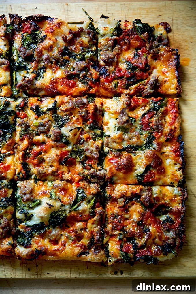 A close-up view of a delicious, just-baked Grandma-style pizza, meticulously cut into square portions on a wooden cutting board, highlighting the textures of its crust and toppings.