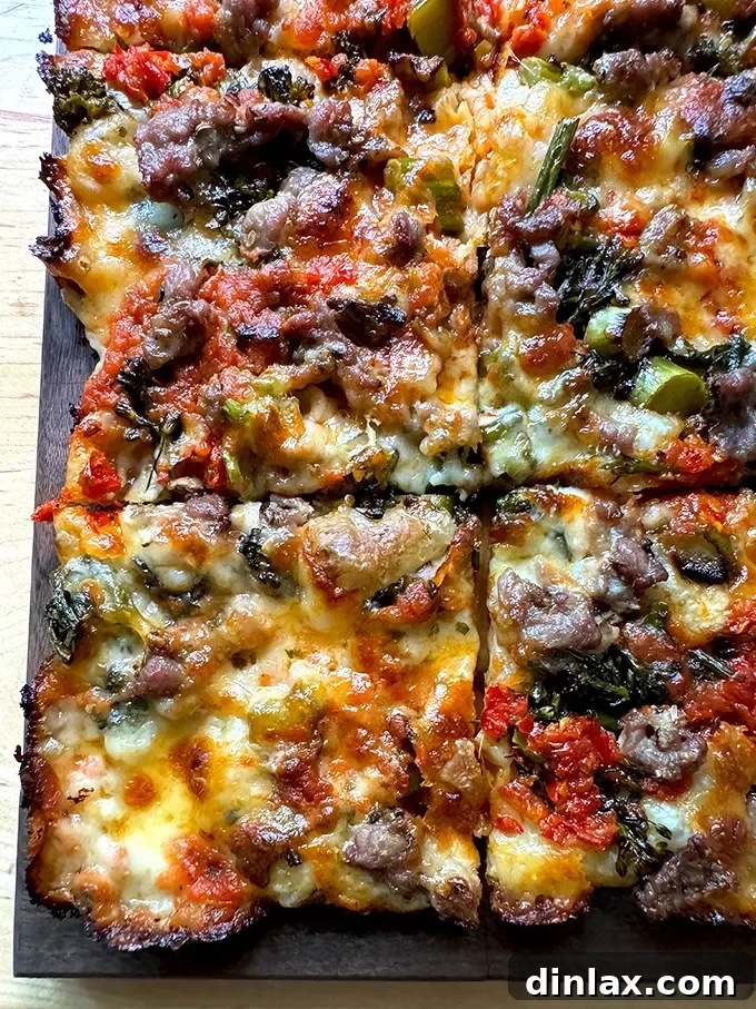 A beautifully presented, just-baked Grandma-style pizza, boasting a perfectly golden crust and vibrant toppings, resting on a wooden cutting board, ready for enjoyment.