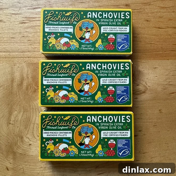 Three elegantly packaged boxes of Fishwife Cantabrian Anchovies, emphasizing their premium status and appeal to gourmet palates.