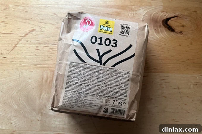 A rustic bag of Petra 0103 flour, suggesting high-quality and unique ingredients for artisanal bread baking.