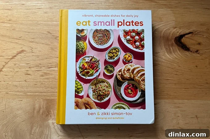 The 'Eat Small Plates' cookbook, featuring a visually enticing cover that suggests an array of vibrant, shareable dishes.
