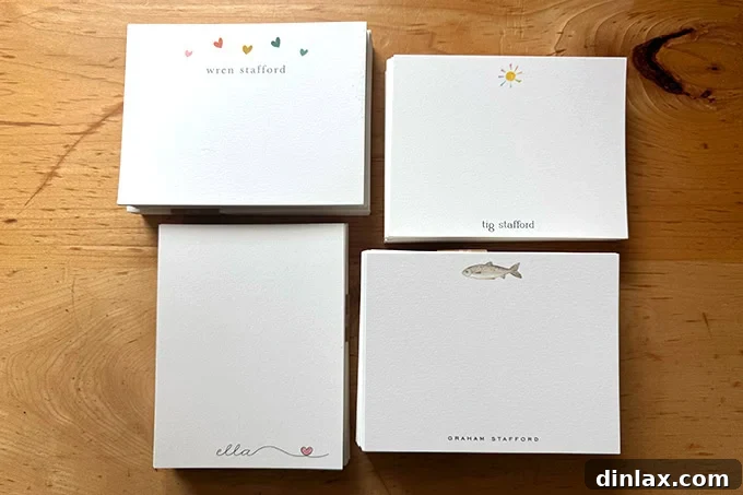 A delightful display of four different personalized kids' stationery sets from Minted, each with unique designs, making thank you notes fun.