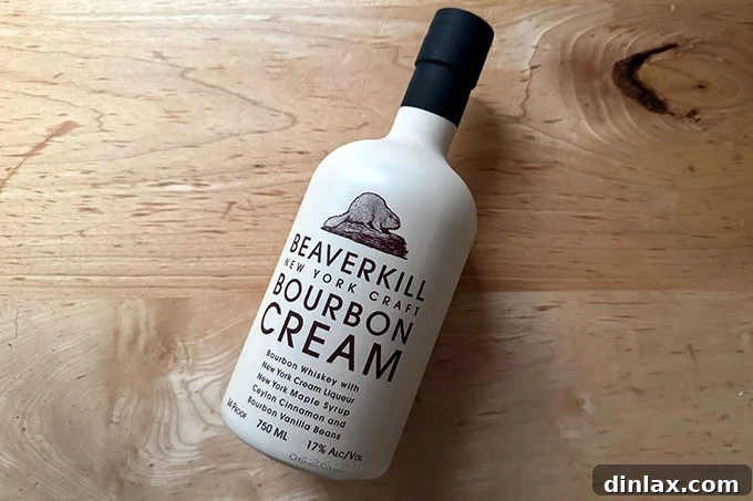 A bottle of Beaverkill Bourbon Cream, elegantly designed, suggesting a rich and indulgent beverage.