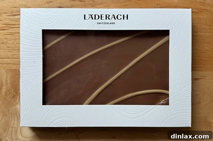 A beautifully presented box of Läderach Dubai Chocolate, showcasing its premium quality and enticing appearance.